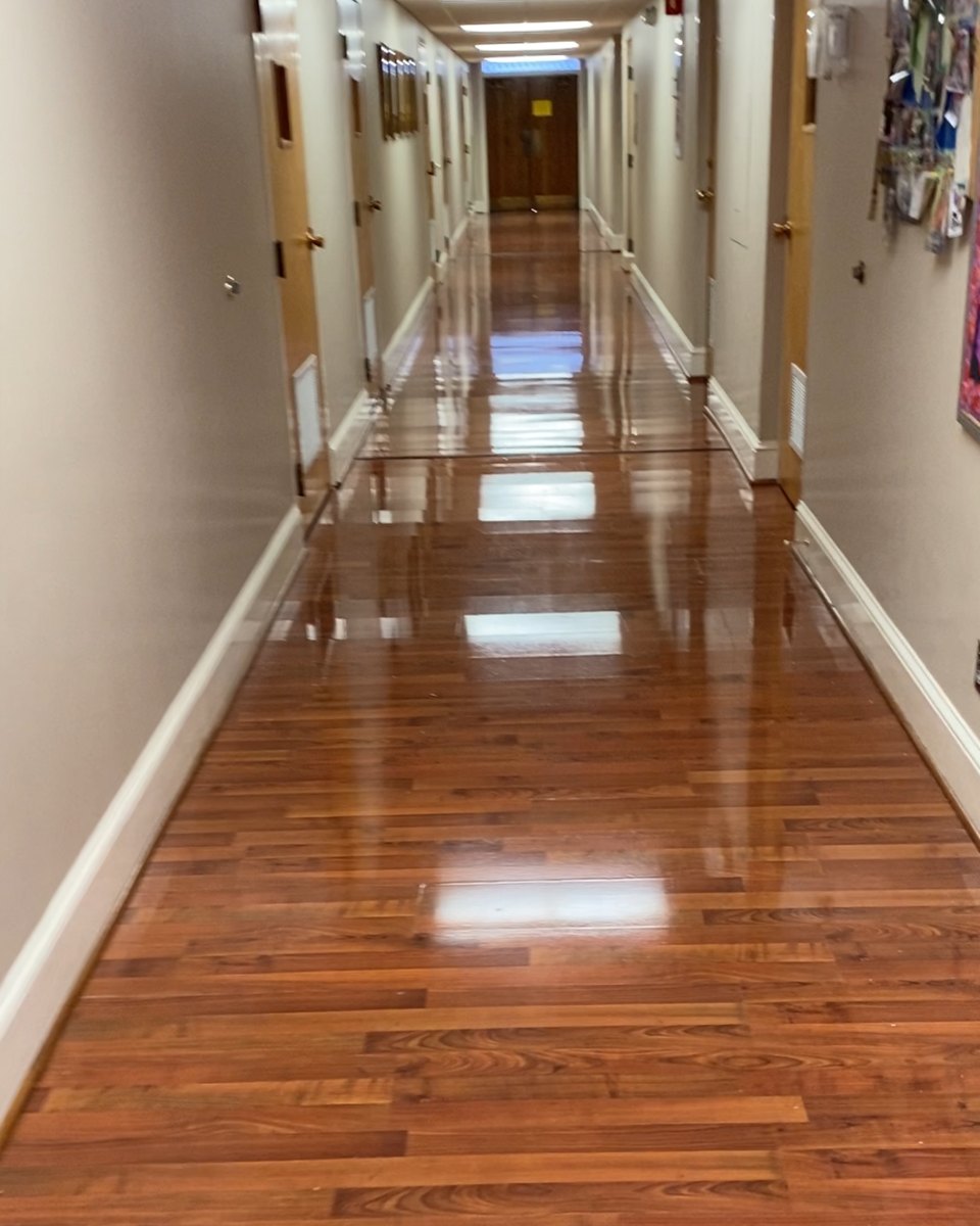 Long hallway floor finished to a high gloss